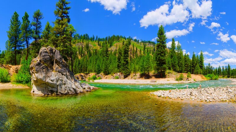 River with Rock Formation — Blue