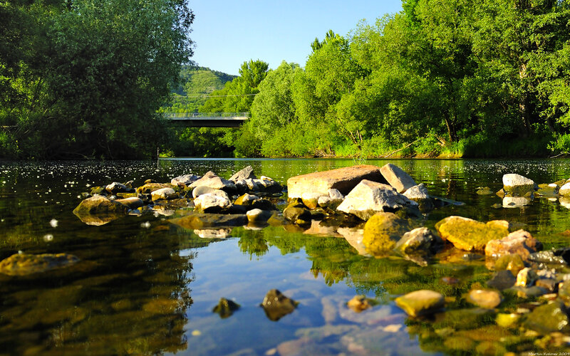 River with Rocks and Bridge