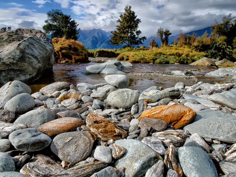 River with Rocks and Mountains