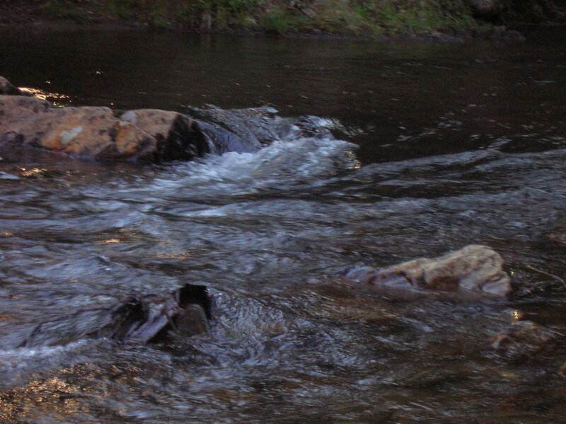 River with Rocks — Brown
