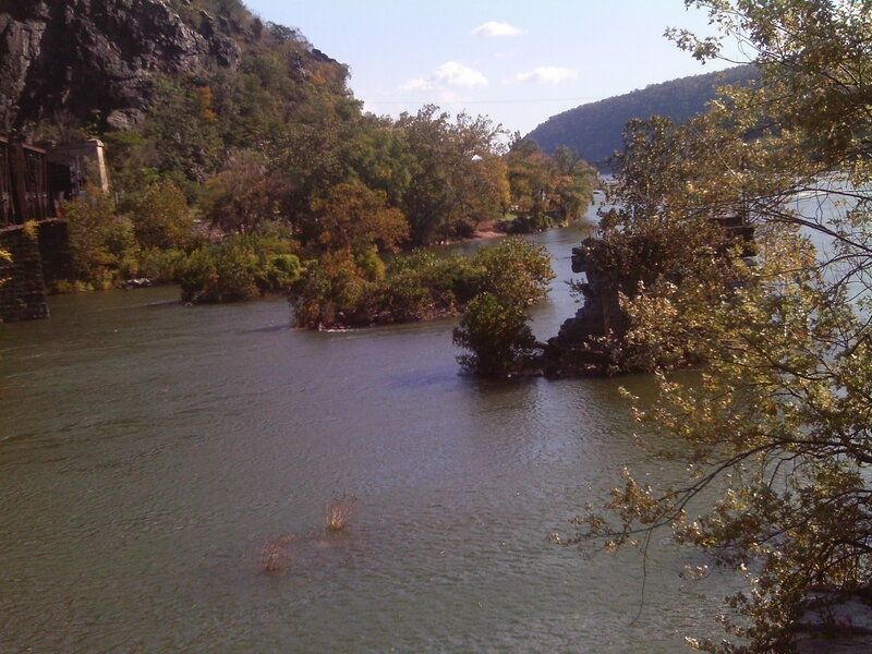 River with Rocky Banks — Green, Calm