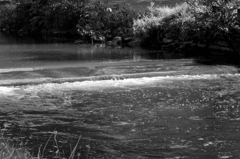 River with Small Waterfall — Black, Calm