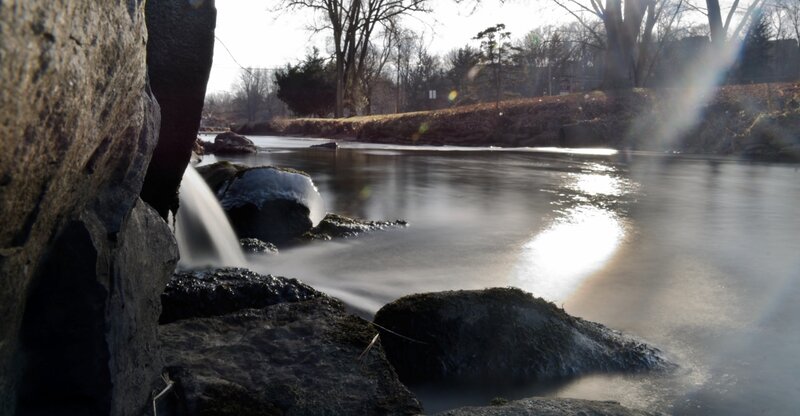 River with Small Waterfall — Gray, Serene
