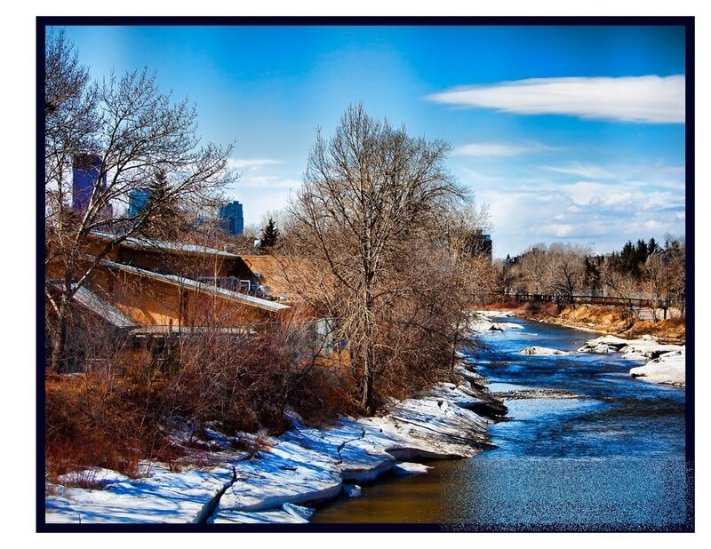 River with Snow and Buildings