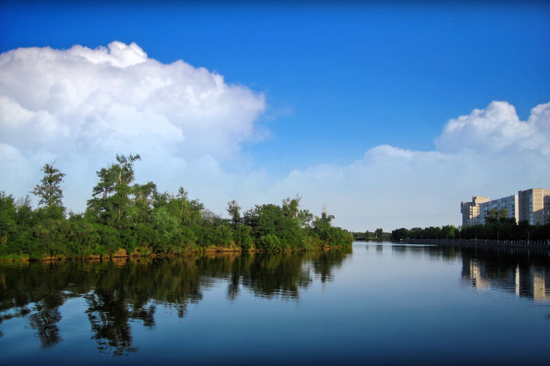 River with Trees and Buildings