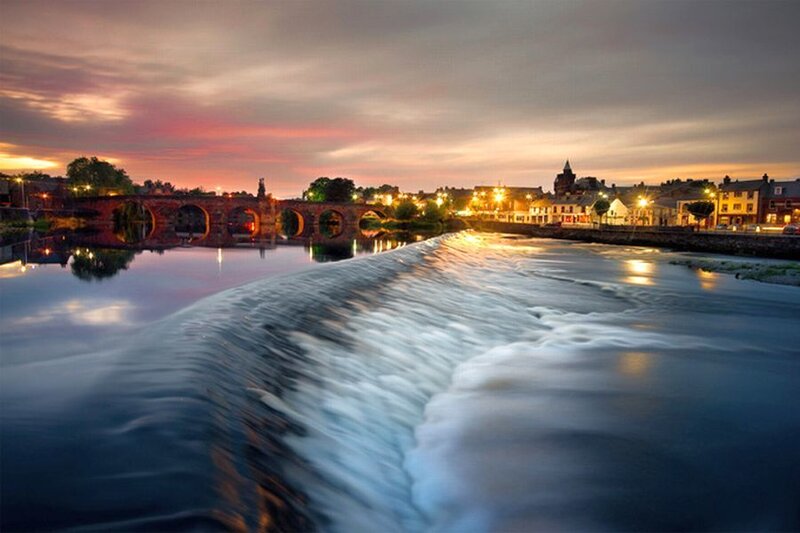 River with Weir and Bridge