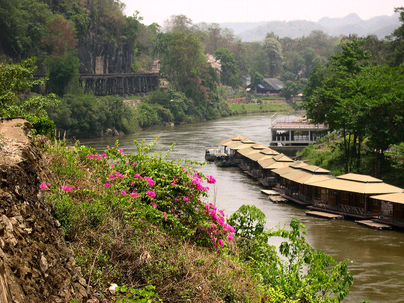 river with wooden houses and bridge