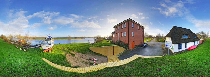 Riverbank with Buildings