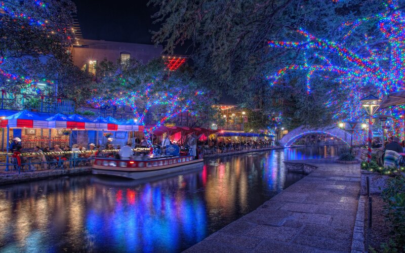 Riverboat on Canal — Blue, Festive, Night, Photograph, Trees, Buildings