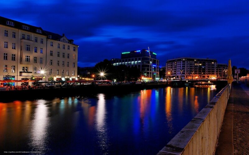 Riverfront Cityscape at Night — Blue
