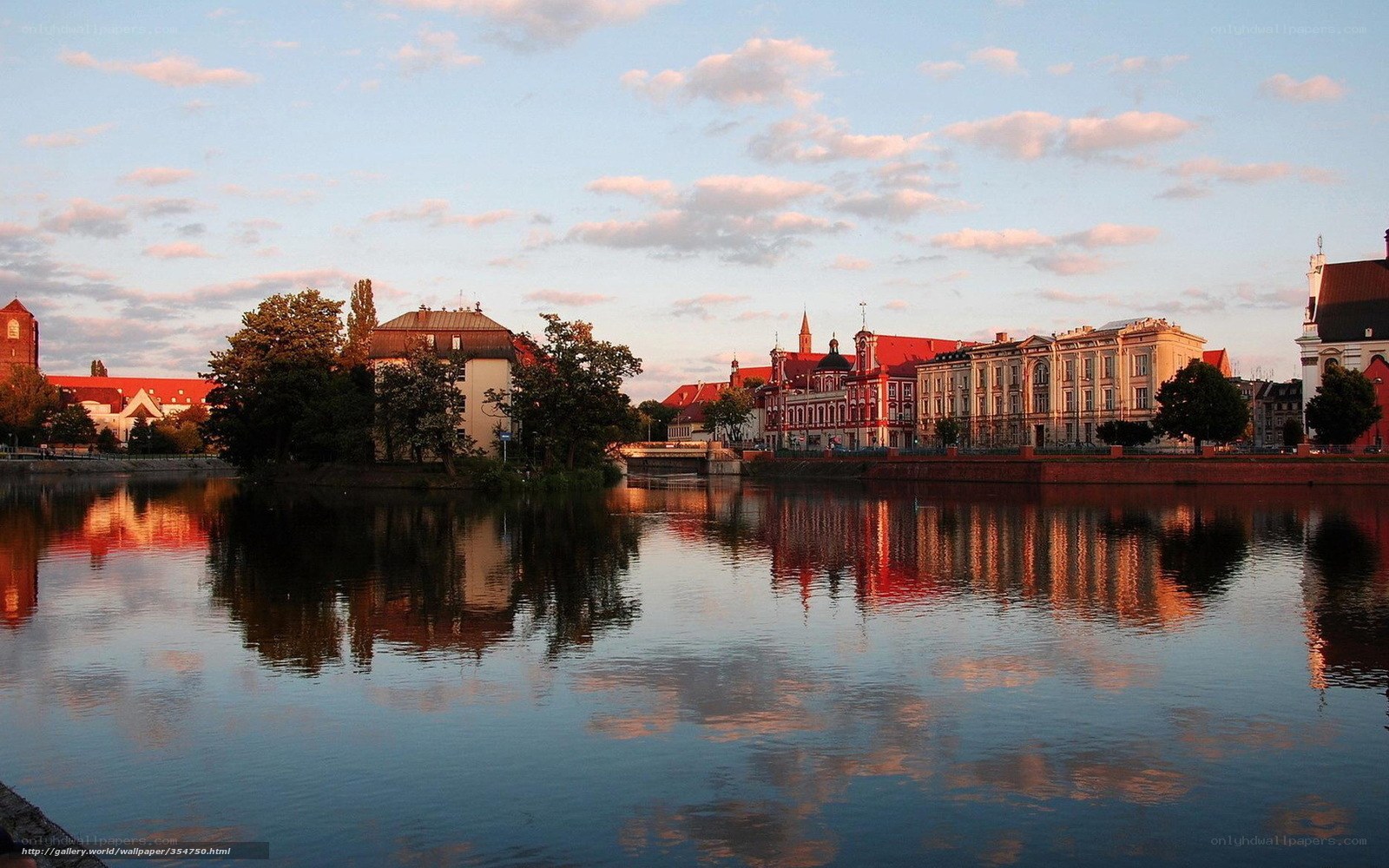 riverfront cityscape at sunset