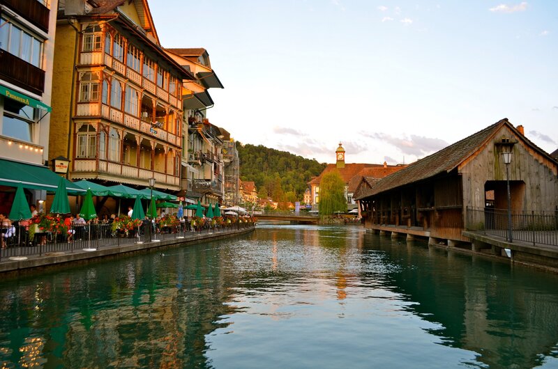 Riverfront scene in a European town