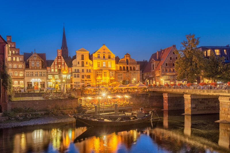 Riverfront Town at Dusk — Blue