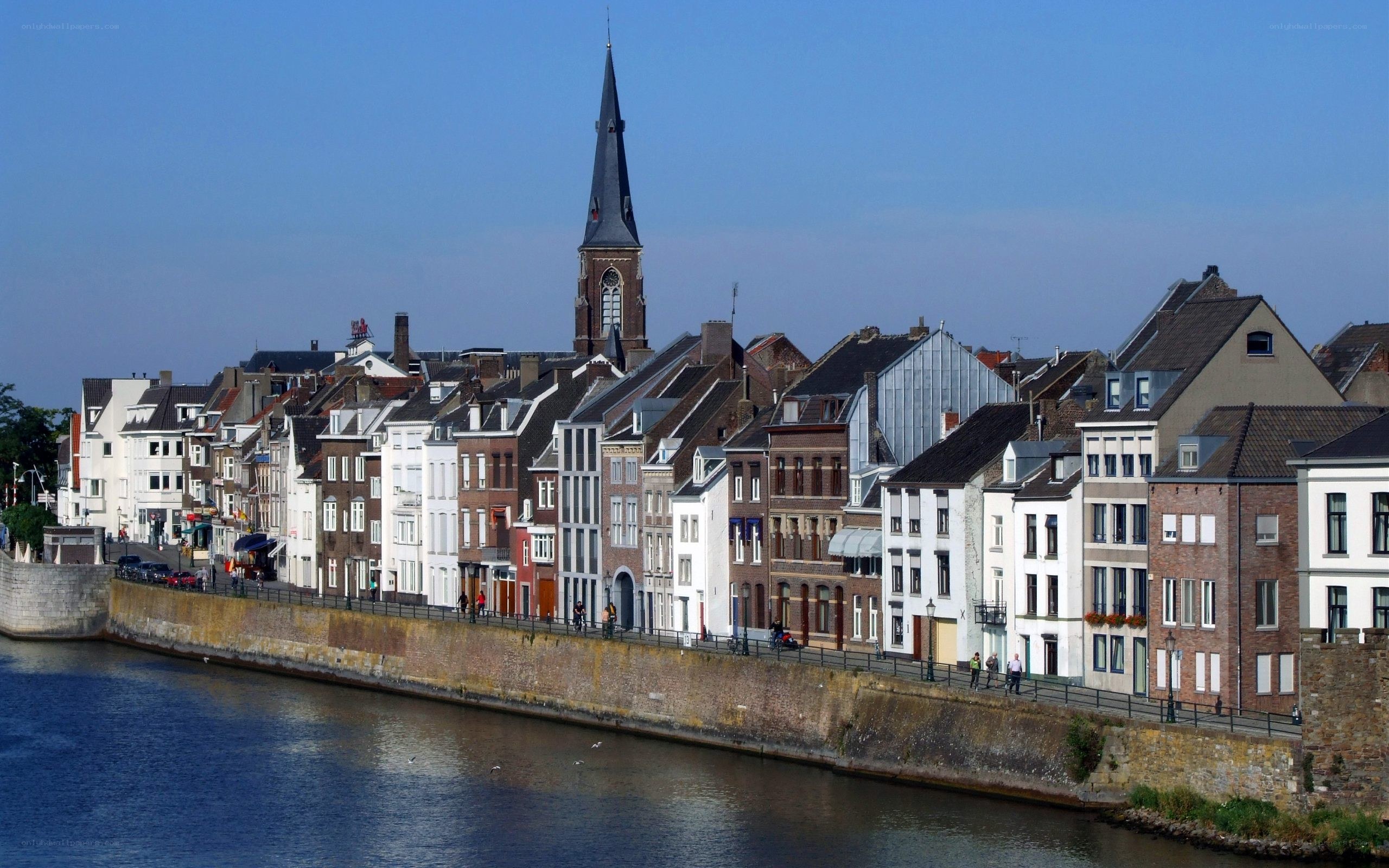 Riverfront town with church spire