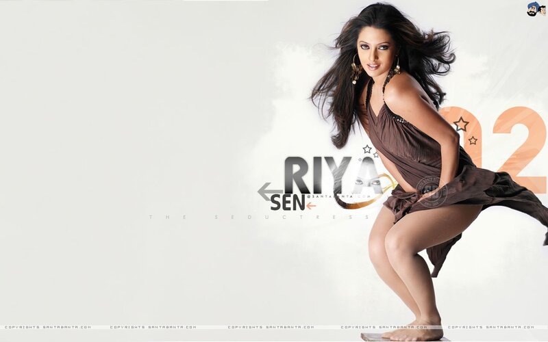 Riya Sen in a brown dress