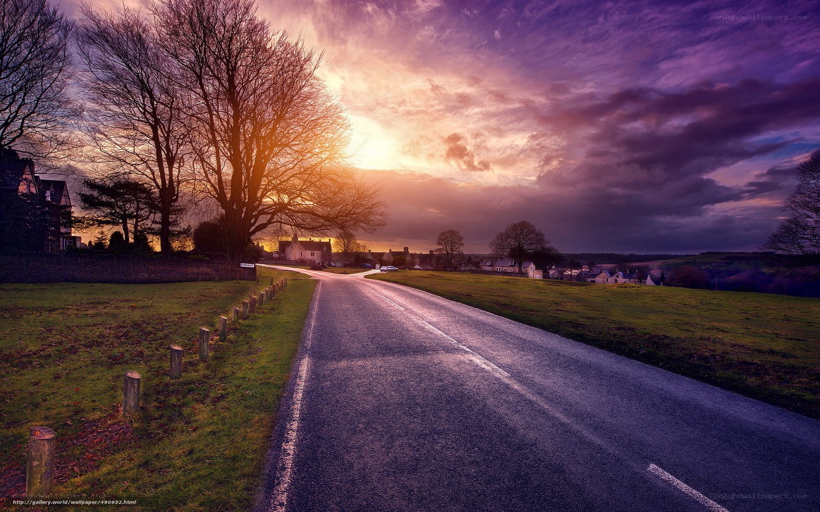 Road at sunset in a village