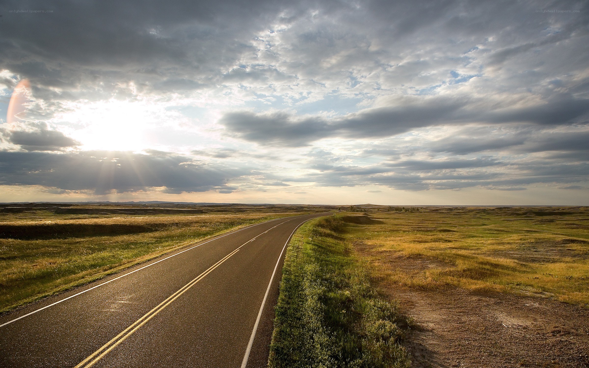 Road at sunset in the plains