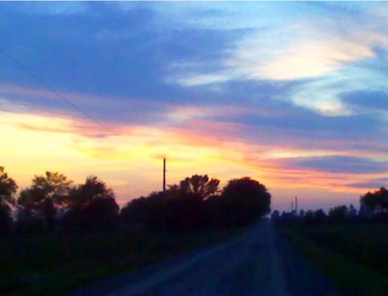 Road at sunset with colorful sky