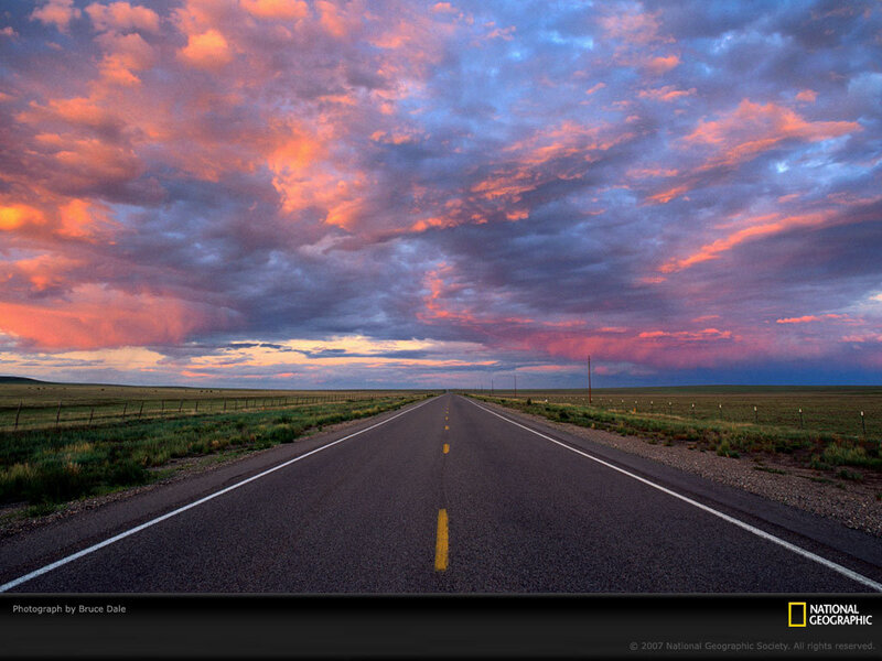 Road at sunset with colorful sky