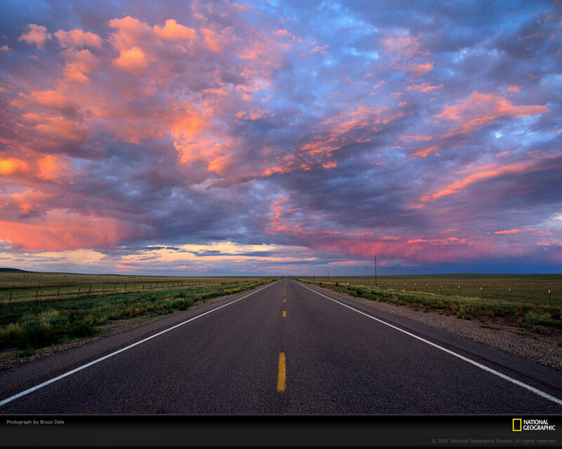 Road at sunset with colorful sky