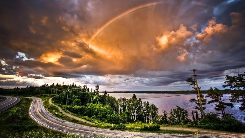 Road Beside Lake under Rainbow