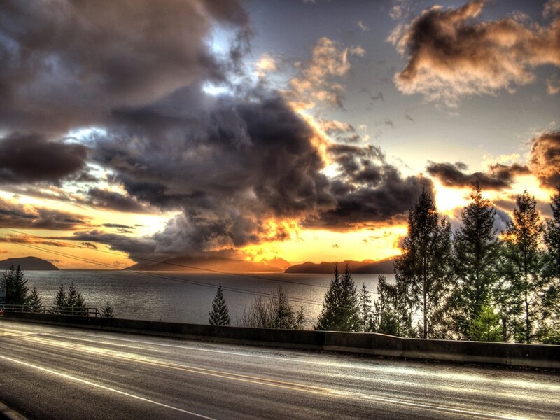 Road Beside Ocean at Sunset