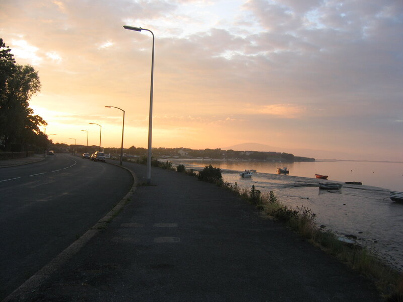 Road Beside Water at Sunset