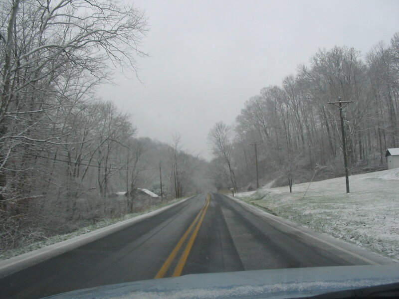 Road in Snowy Forest