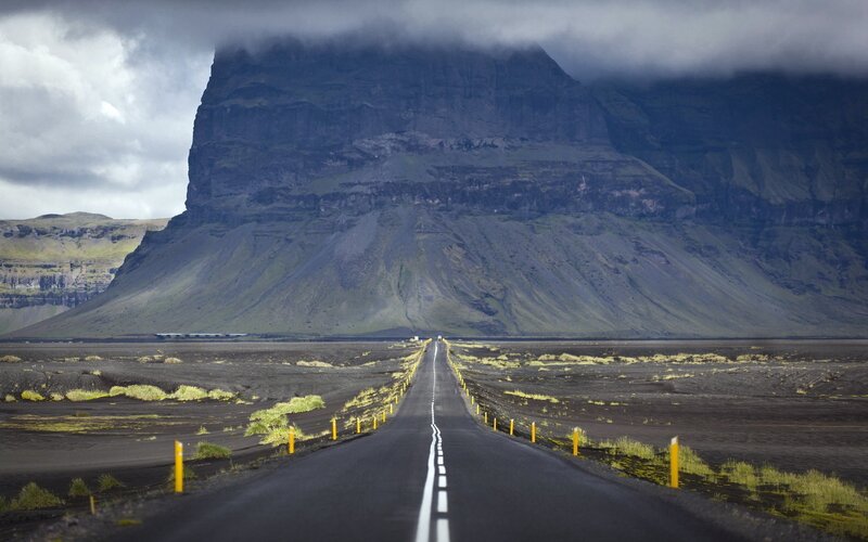 Road Leading to Mountain — Black, Dramatic, Photograph, Clouds