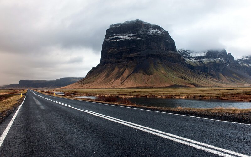 Road leading to mountain in Iceland
