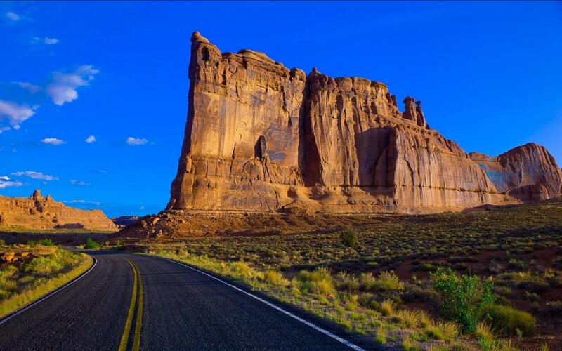 Road Leading to Rock Formation — Blue, Serene