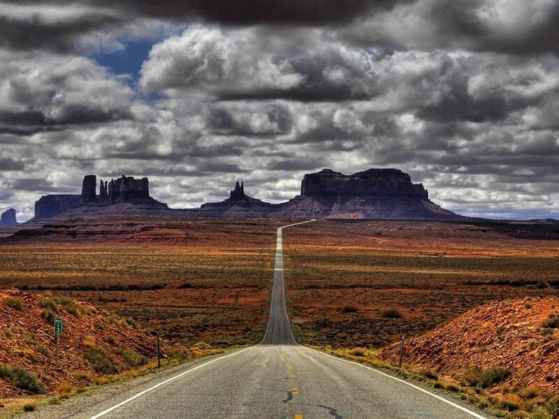 Road Leading to Rock Formations — Gray, Dramatic