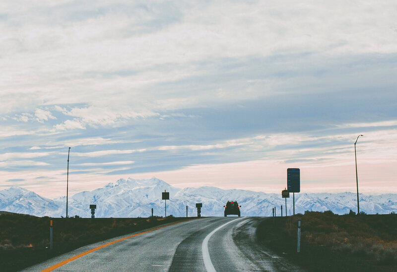 Road leading to snowy mountains