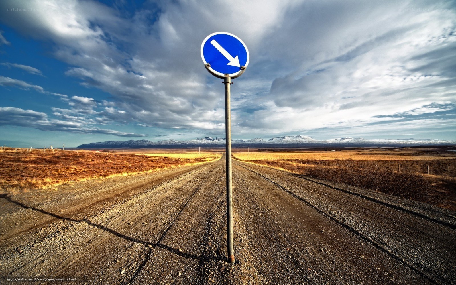 Road sign on a gravel path