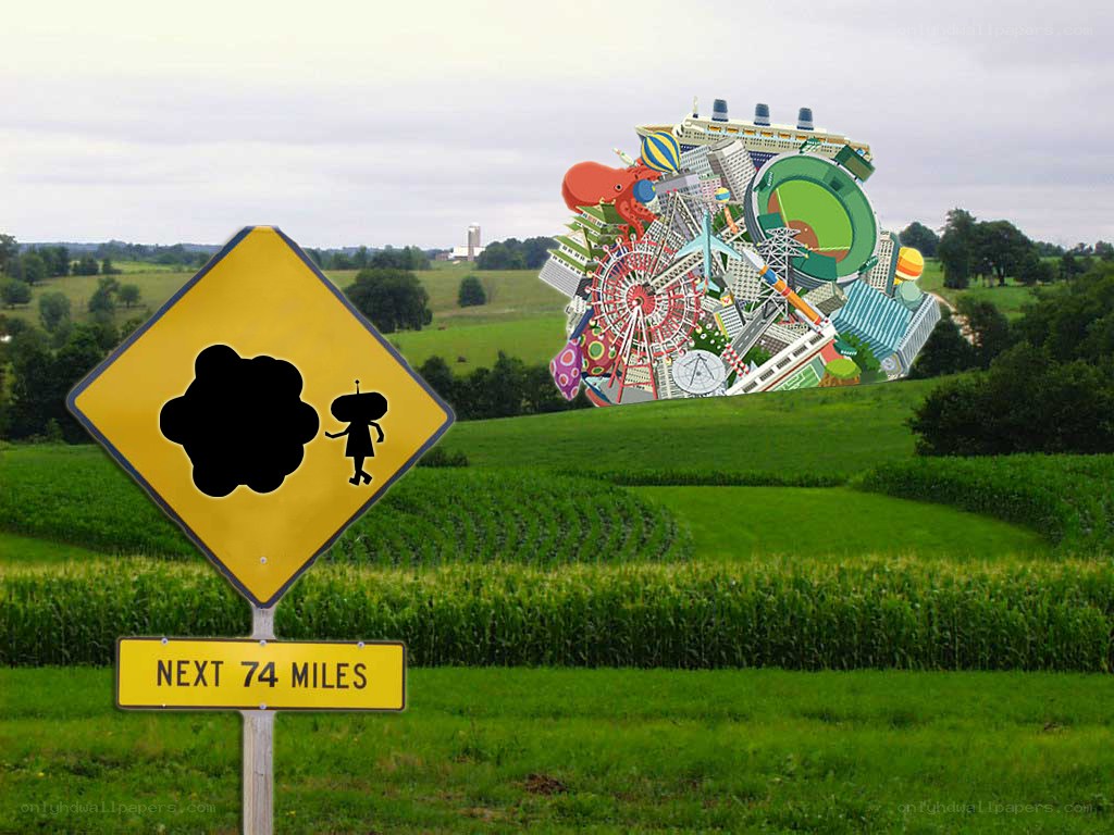 road sign with alien sculpture