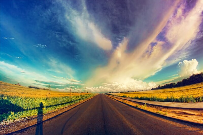 Road Stretching Through Fields