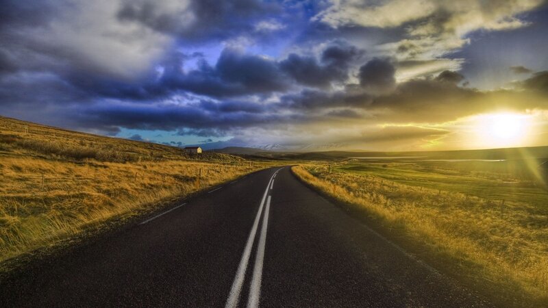 Road Stretching to Horizon — Blue, Dramatic, Sunset, Photograph, Clouds, Sun, House, Hills