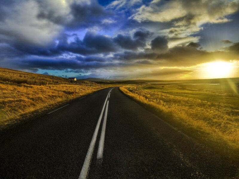 Road Stretching to Horizon — Blue, Dramatic, Sunset, Photograph, Sun, Clouds, Field
