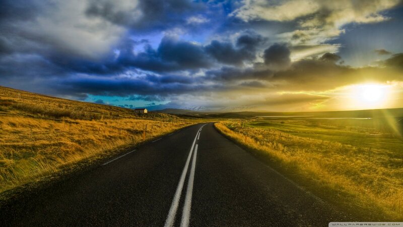Road Stretching to Horizon — Blue, Dramatic, Sunset, Photograph, Sun, Clouds