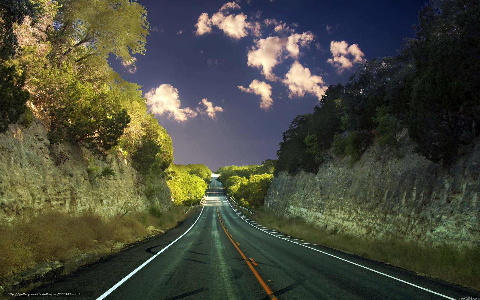Road through a canyon at dusk
