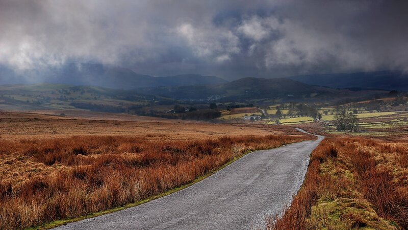 Road through a moorland landscape