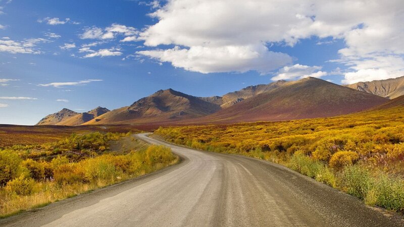 Road through autumn mountains