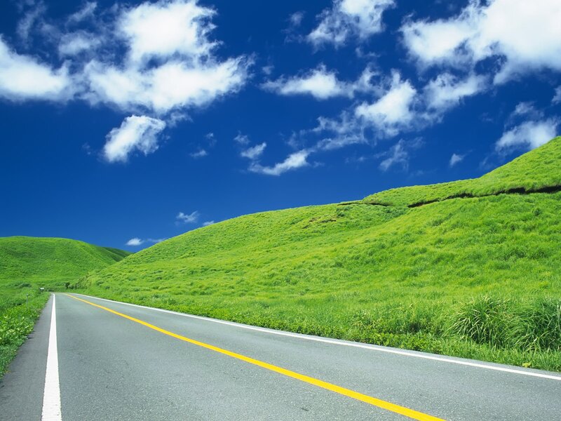 Road through green hills