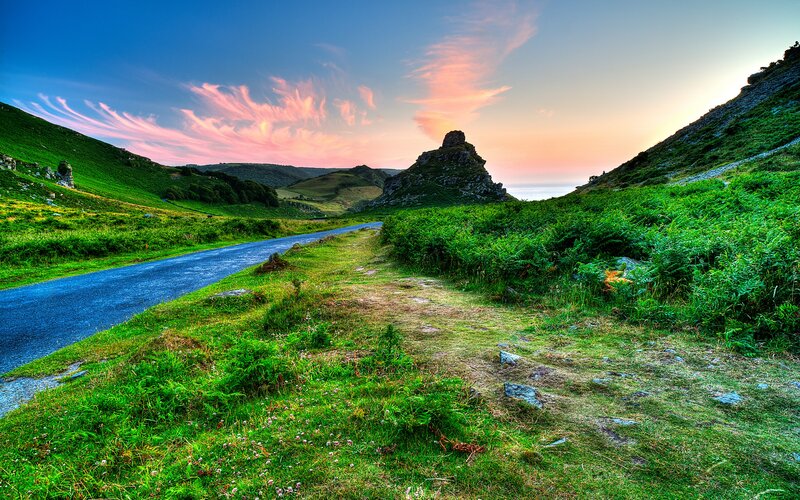 Road Through Green Hills — Serene, Sunset