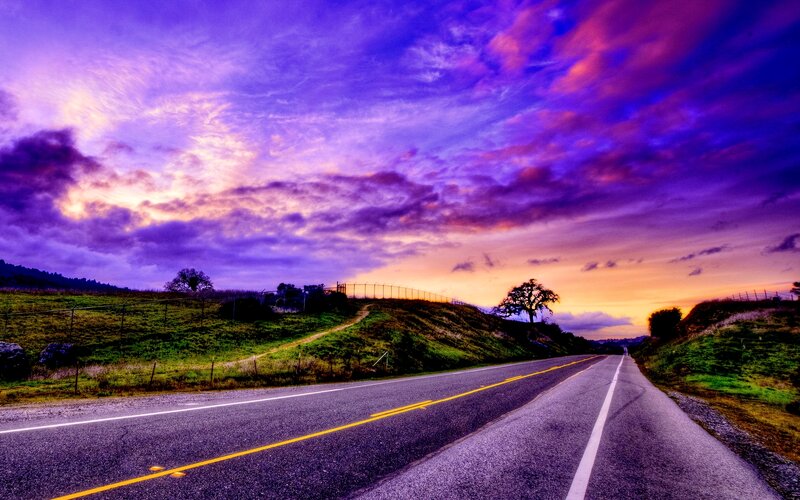 Road Through Hills at Sunset