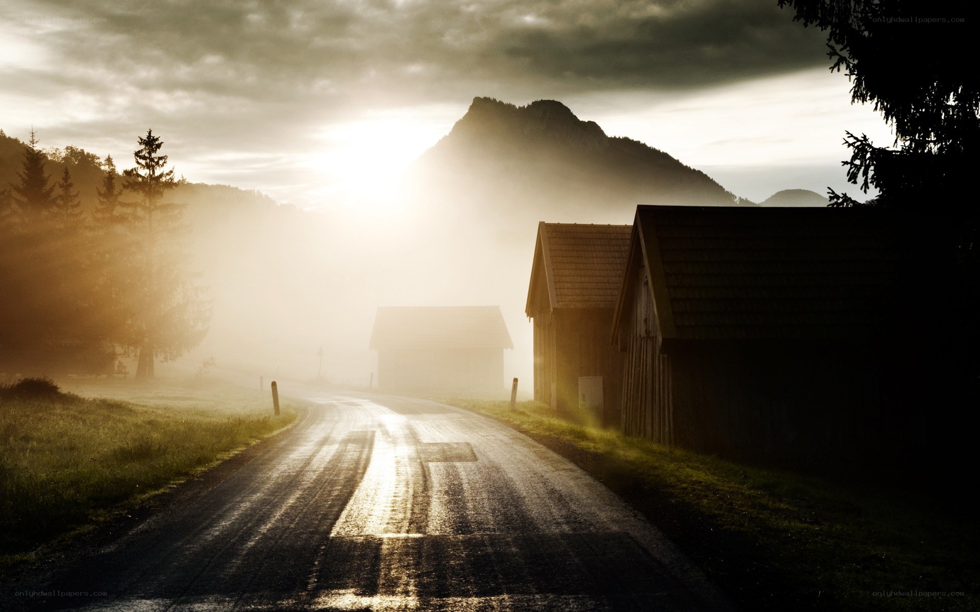 Road through misty mountain village