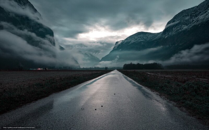 Road through misty mountains