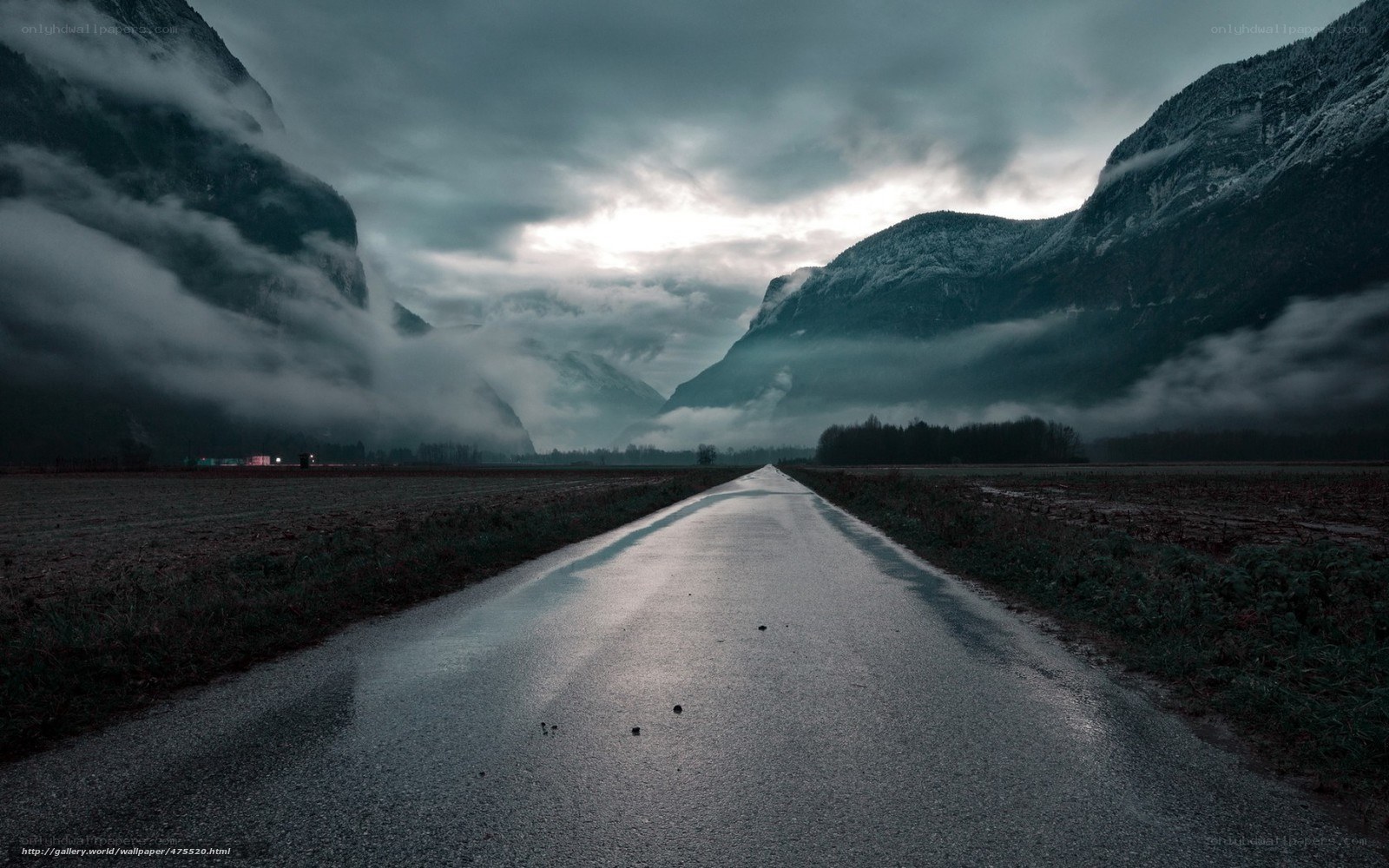 Road through misty mountains