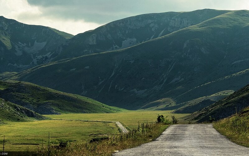 Road through mountain valley