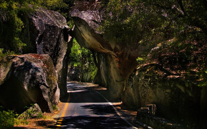Road through natural rock arch